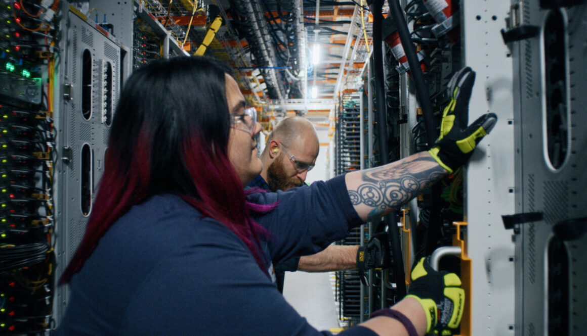 Technical engineer checking the servers in data center