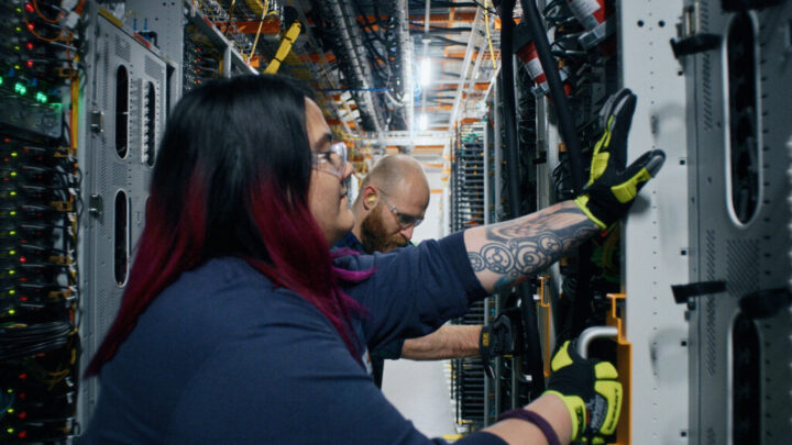 Technical engineer checking the servers in data center